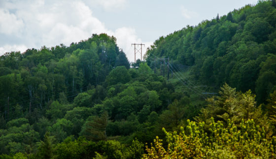Photo of transmission line over a mountain