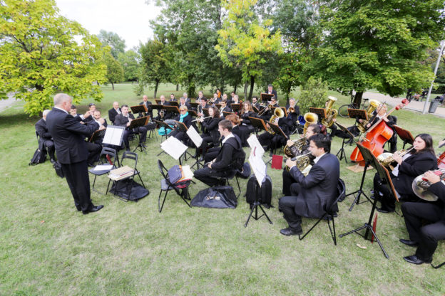 Photo of a symphony orchestra in a park