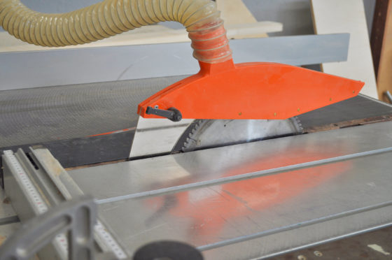 Photo of saw table with cover over blade