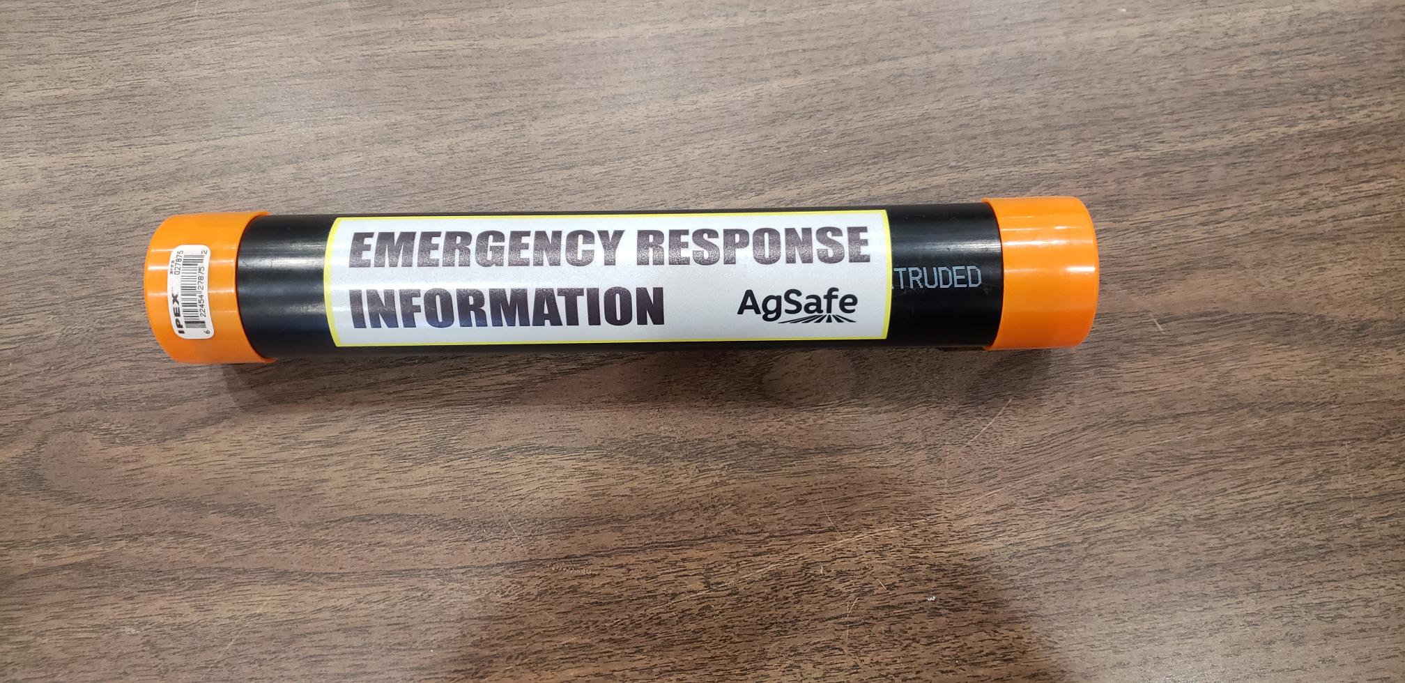 Photo of an emergency information tube with a label from AgSafe