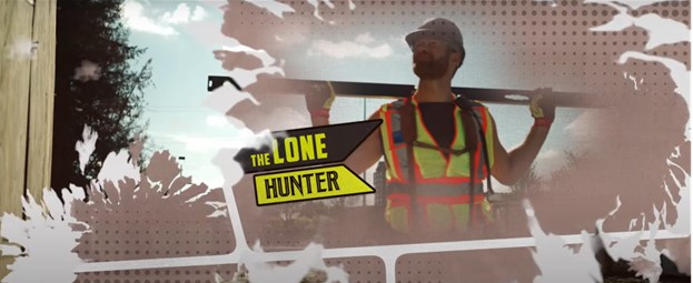 Photo of a man on a construction site wearing a high vis vest with The Lone Hunter written across the screen.