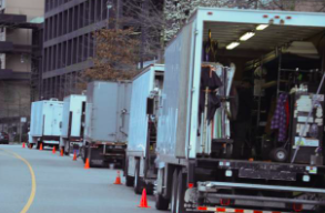 Photo of movie set trucks getting ready for a shoot