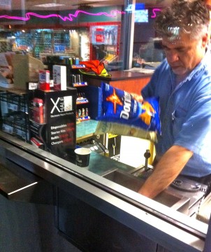 Photo of worker in convenience store