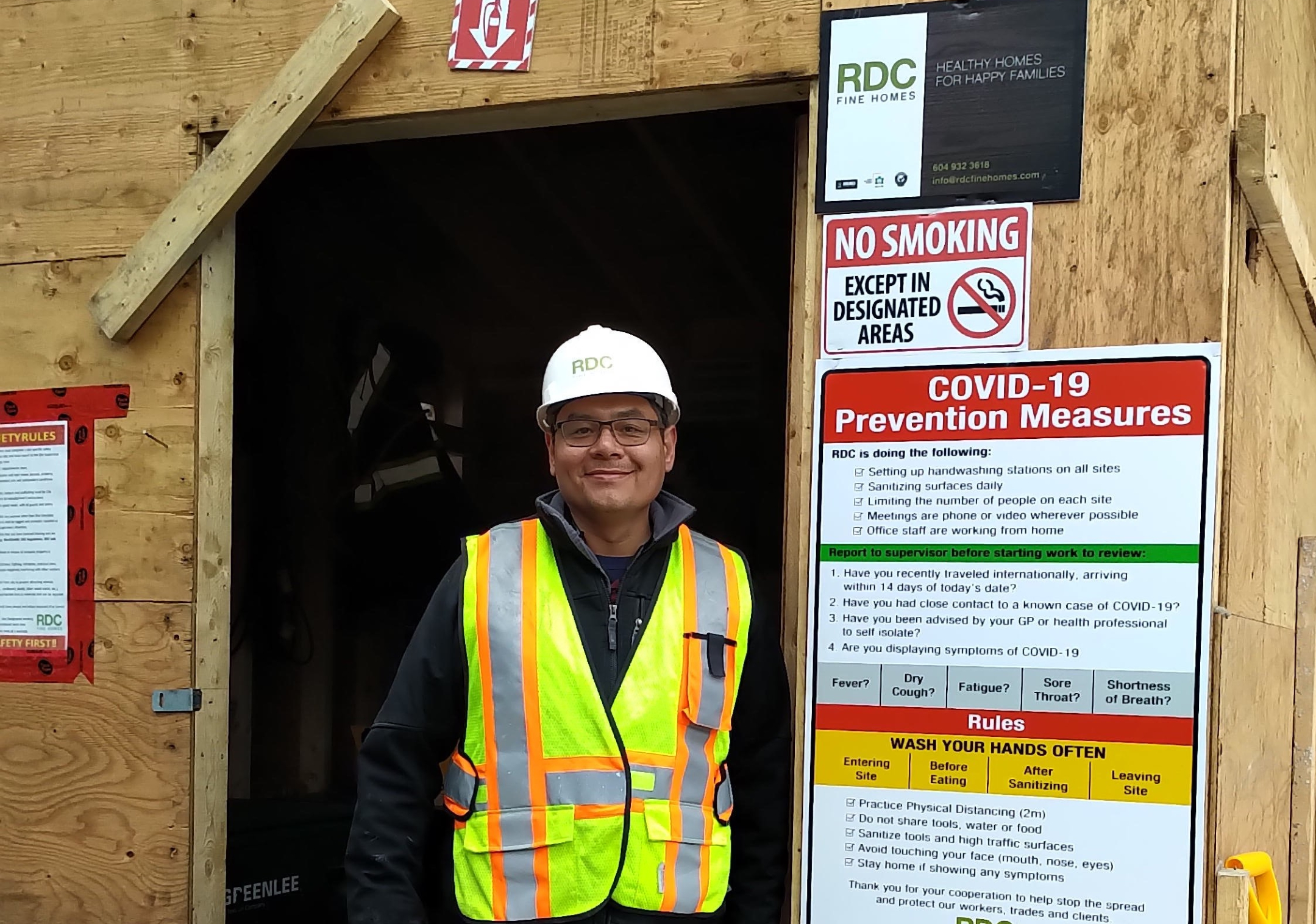 Photo of COVID-19 compliance officer at worksite